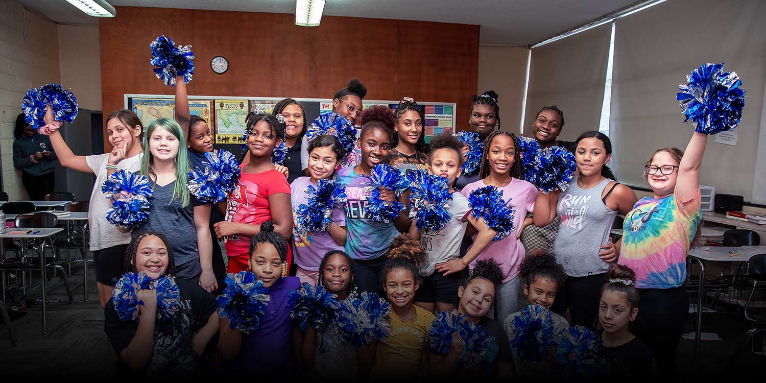 Group of smiling cheerleaders